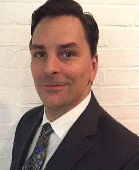 John Rassmussens Headshot